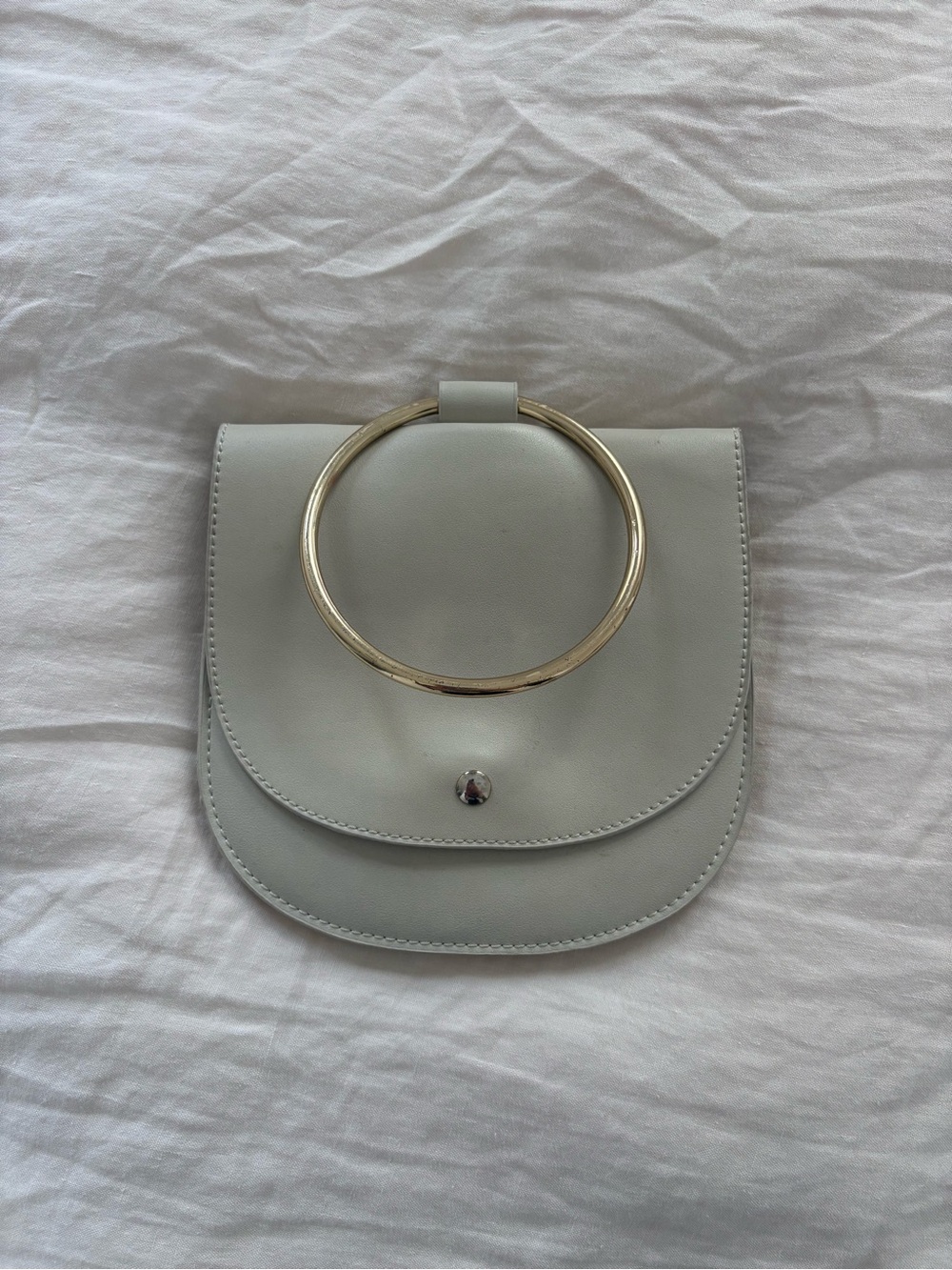 Cream clutch with gold handle - perfect wedding bag!